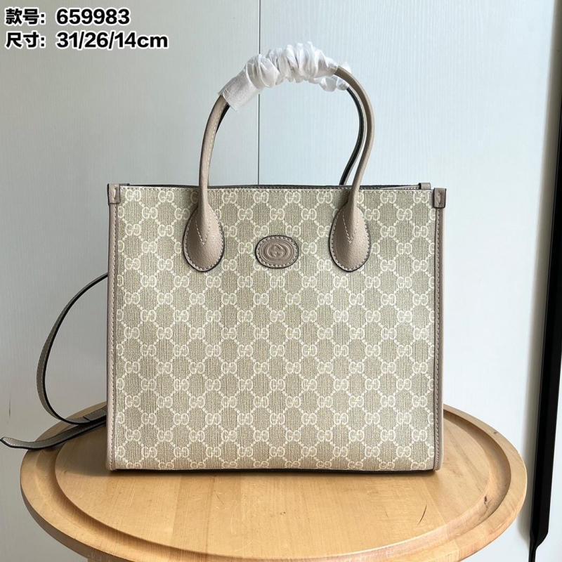 G*u*i shopping bags